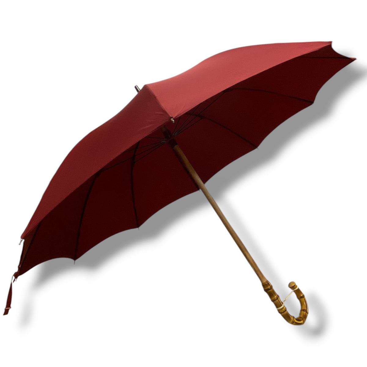 Regenschirm mit Bambusgriff auf einem Schwanenhalsstiel mit 10 Streben. Handgefertigt von Ombrelli Domizio seit 1989. Hergestellt in Italien.